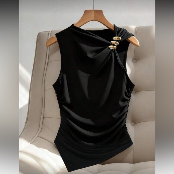 One-Shoulder Black Top with Gold Charm Detail